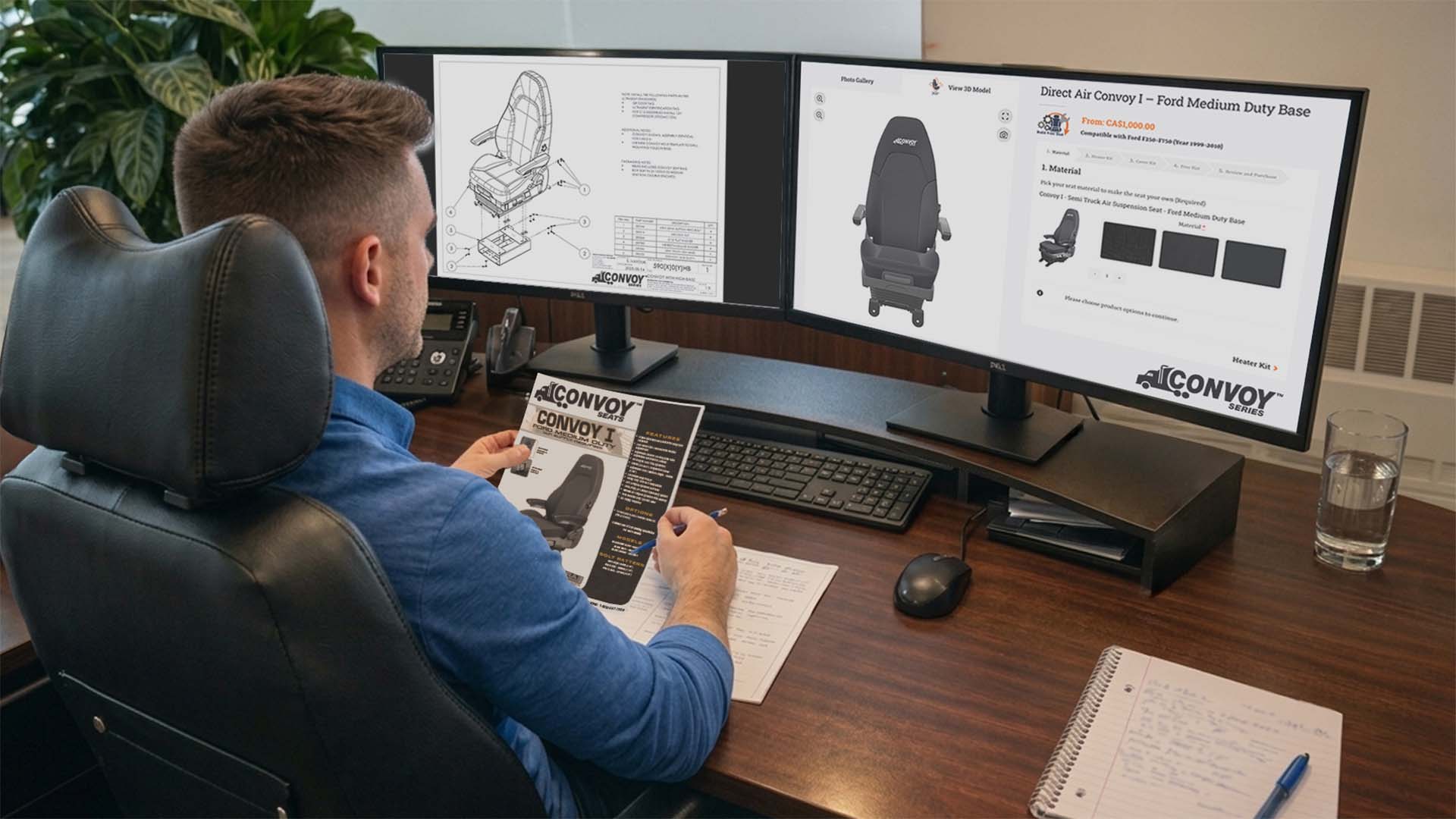 engineer-at-desk-looking-at-screens Engineer at a desk reviewing technical CAD drawings and a product brochure for the Convoy III truck seat.